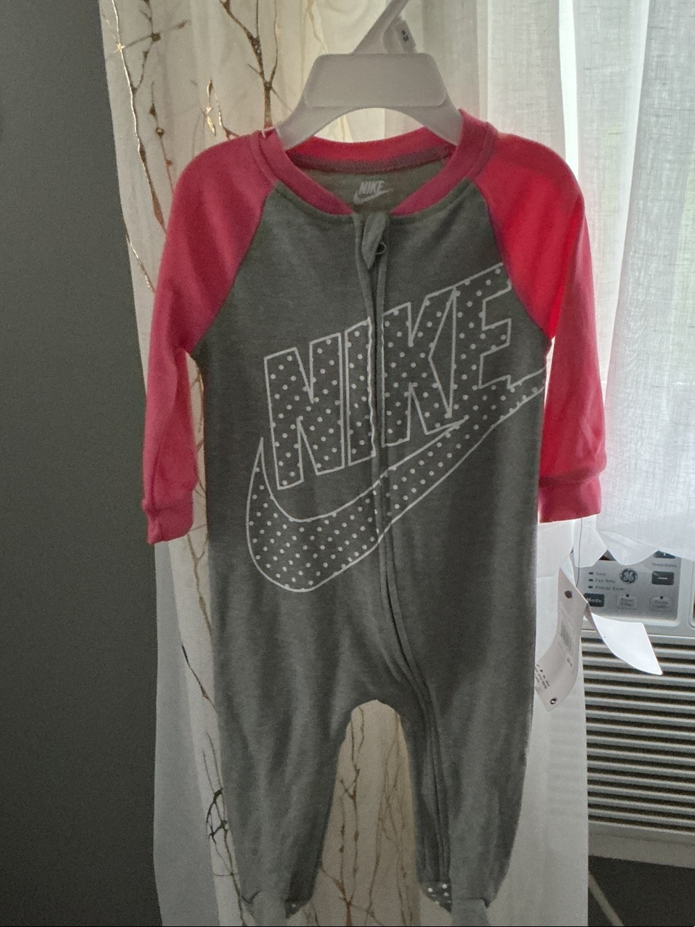 Nike Grey One-Piece Bodysuit with Pink Sleeves